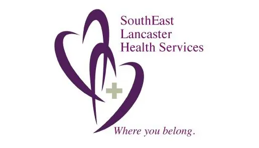 Logo for SouthEast Lancaster Health Services with two overlapping purple heart shapes, a green cross, and the slogan Where you belong. in purple text.